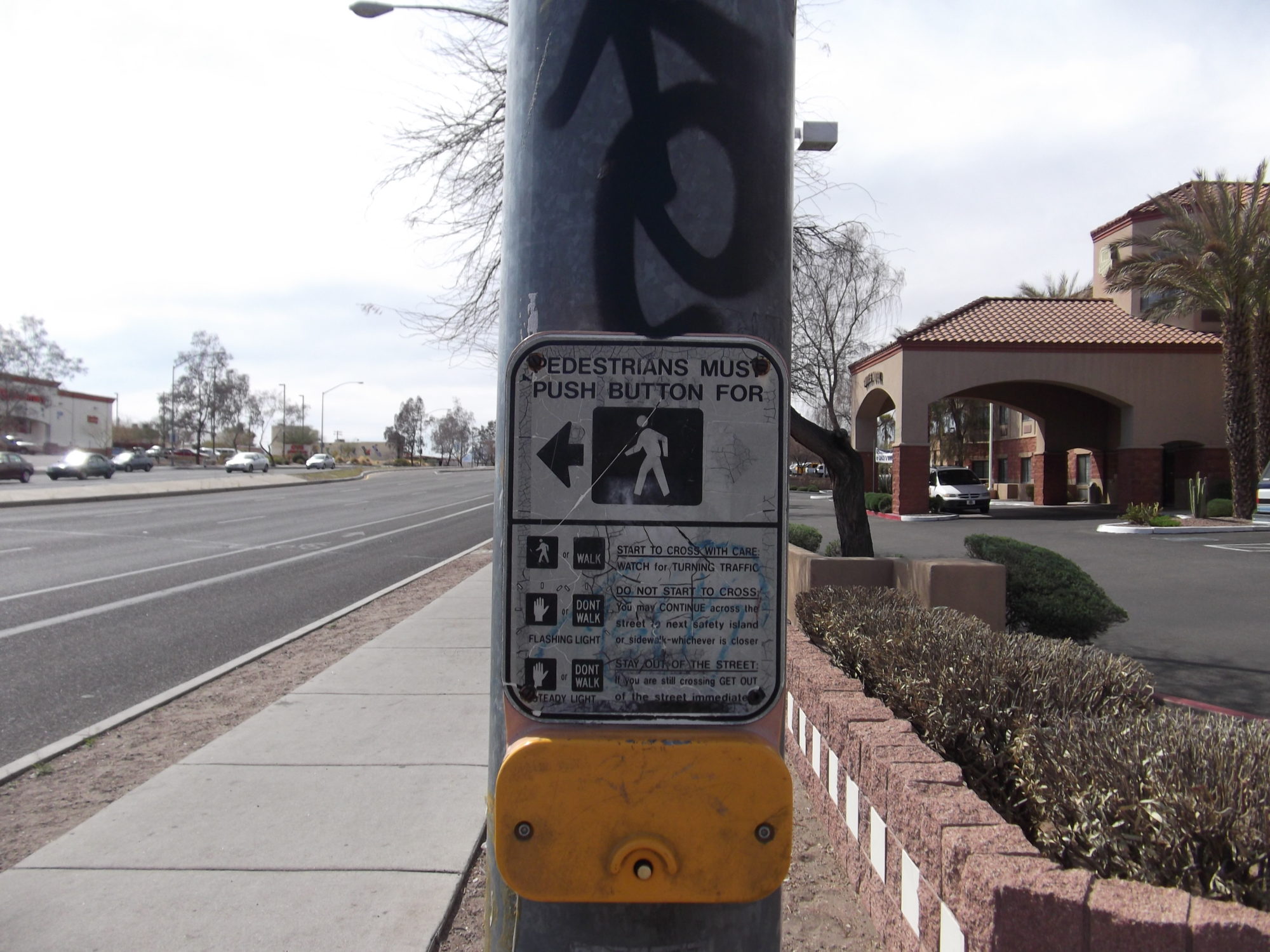 cropped-crossbutton.jpg